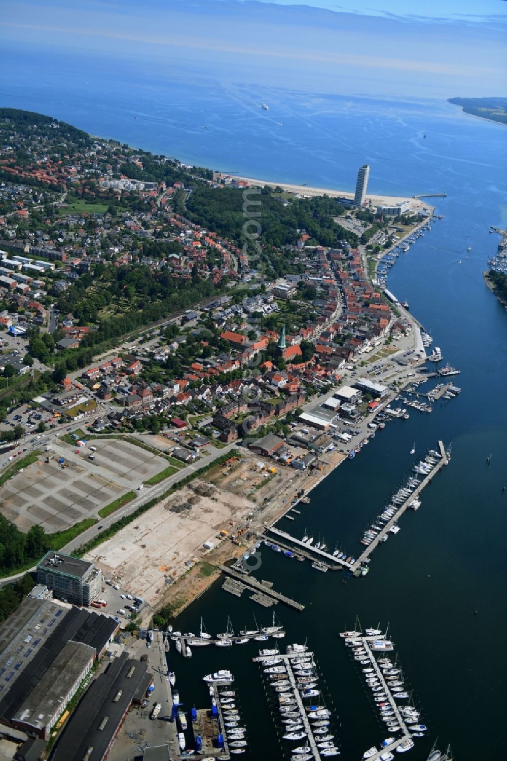 Lübeck from the bird's eye view: Residential construction site with multi-family housing development- on the Auf dem Baggersand in Travemuende in the state Schleswig-Holstein, Germany