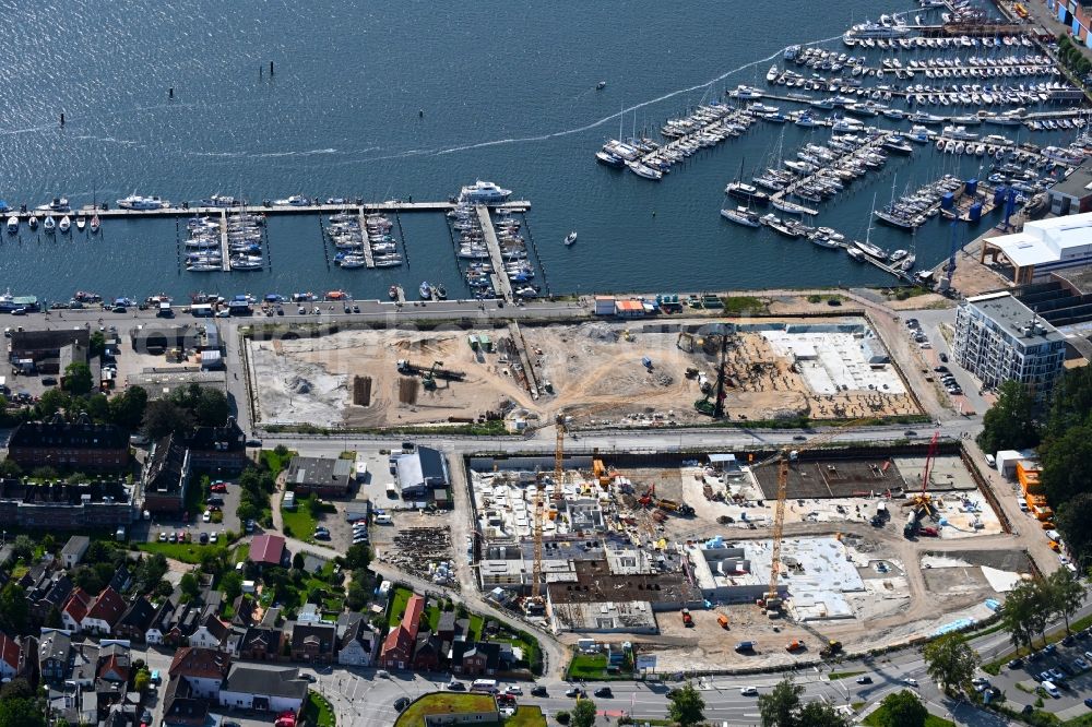 Travemünde from the bird's eye view: Residential construction site with multi-family housing development- on the Auf dem Baggersand in Travemuende in the state Schleswig-Holstein, Germany