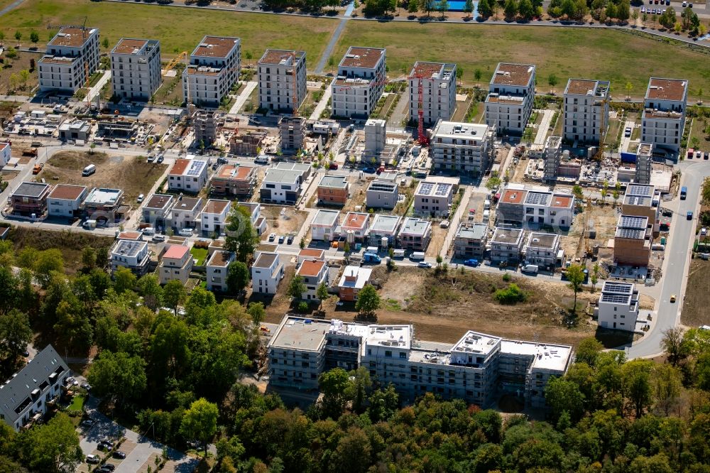 Aerial image Würzburg - Residential construction site with multi-family housing development- on the along the Norbert-Glanzberg-strasse in Wuerzburg in the state Bavaria, Germany Two larger buildings were built by the construction community Wuerzburg GbR and planned for the companies bogevischs buero architekten & stadtplaner GmbH and bauart Konstruktions GmbH + Co. KG, and more of the INDUSTRIA WOHNEN GmbH are to be built here