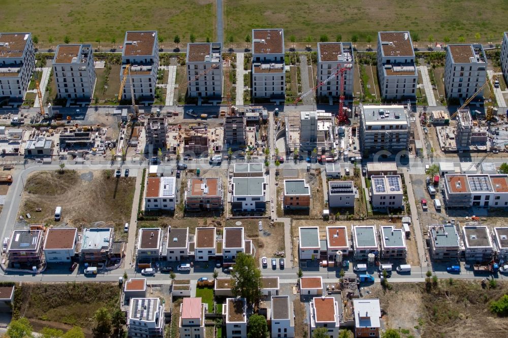 Aerial photograph Würzburg - Residential construction site with multi-family housing development- on the along the Norbert-Glanzberg-strasse in Wuerzburg in the state Bavaria, Germany Two larger buildings were built by the construction community Wuerzburg GbR and planned for the companies bogevischs buero architekten & stadtplaner GmbH and bauart Konstruktions GmbH + Co. KG, and more of the INDUSTRIA WOHNEN GmbH are to be built here