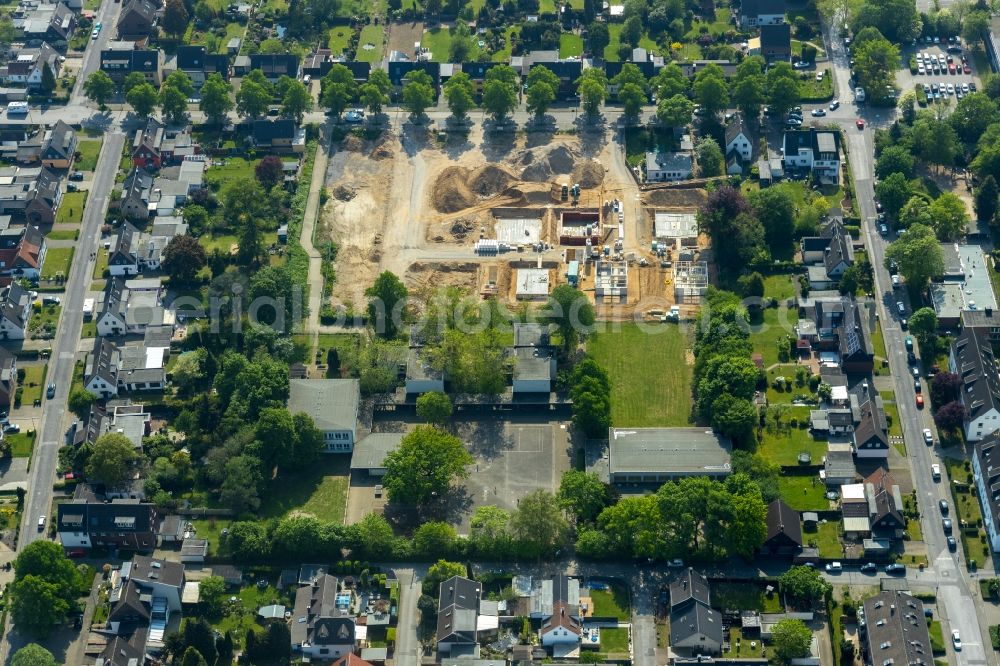 Duisburg from the bird's eye view: Residential construction site with multi-family housing development- on the Luederitzallee in Duisburg in the state North Rhine-Westphalia, Germany