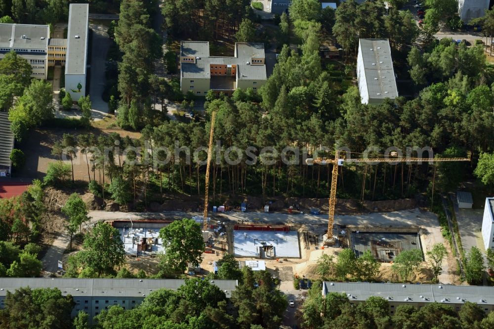 Aerial photograph Potsdam - Residential construction site with multi-family housing development- on the Am Moosfenn in the district Waldstadt in Potsdam in the state Brandenburg, Germany