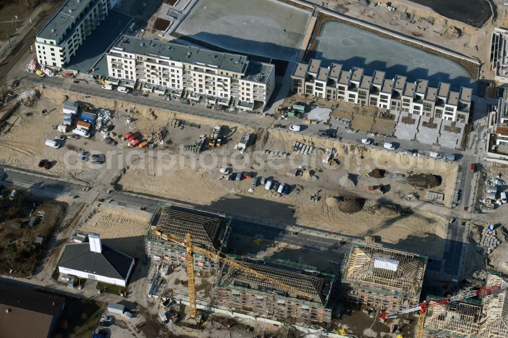Aerial photograph Berlin - Residential area construction site with multi-family housing development - new building Neue Wasserliebe - 52 Grad Nord Wohnen am Wasser in Berlin-Gruenau on the banks of the river Dahme at Teichmummelring - An der Dahme - Gaffelsteig - Regattastrasse in the district of Gruenau in Berlin, Germany