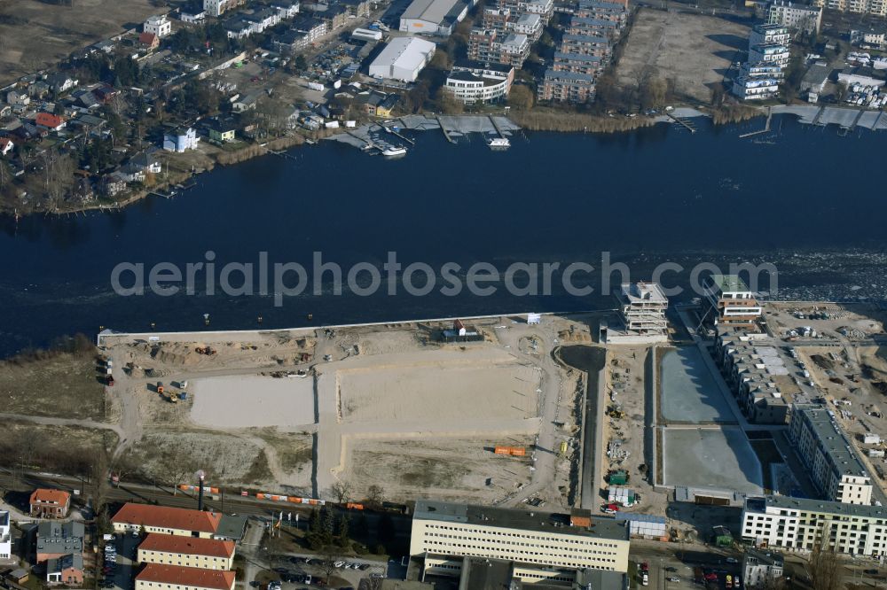 Berlin from above - Residential area construction site with multi-family housing development - new building Neue Wasserliebe - 52 Grad Nord Wohnen am Wasser in Berlin-Gruenau on the banks of the river Dahme at Teichmummelring - An der Dahme - Gaffelsteig - Regattastrasse in the district of Gruenau in Berlin, Germany