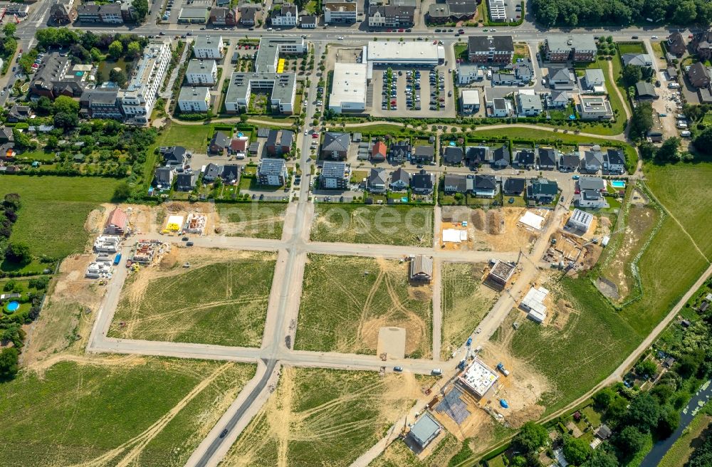 Kamp-Lintfort from the bird's eye view: Residential construction site with multi-family housing development- on the Hardehausen-Strasse - Marienhave-Strasse - Walkenried-Strasse in the district Niersenbruch in Kamp-Lintfort in the state North Rhine-Westphalia, Germany