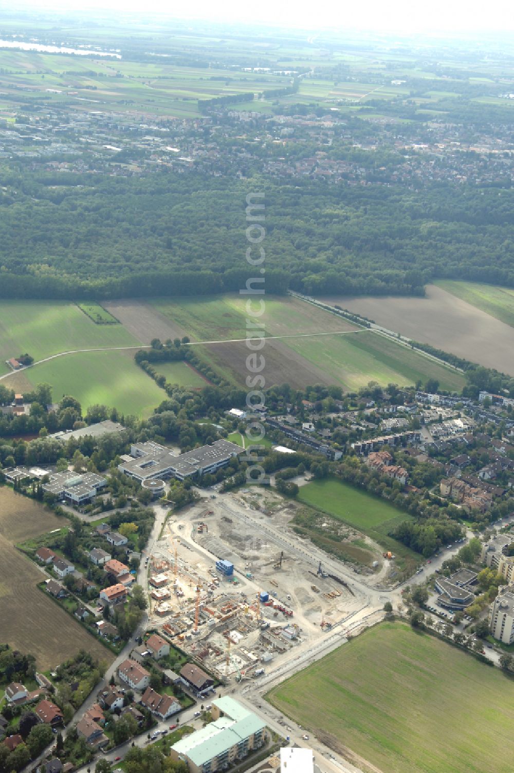 Garching bei München from the bird's eye view: Residential construction site with multi-family housing development- Professor-Angermair-Ring corner Muehlfeldweg in Garching bei Muenchen in the state Bavaria, Germany