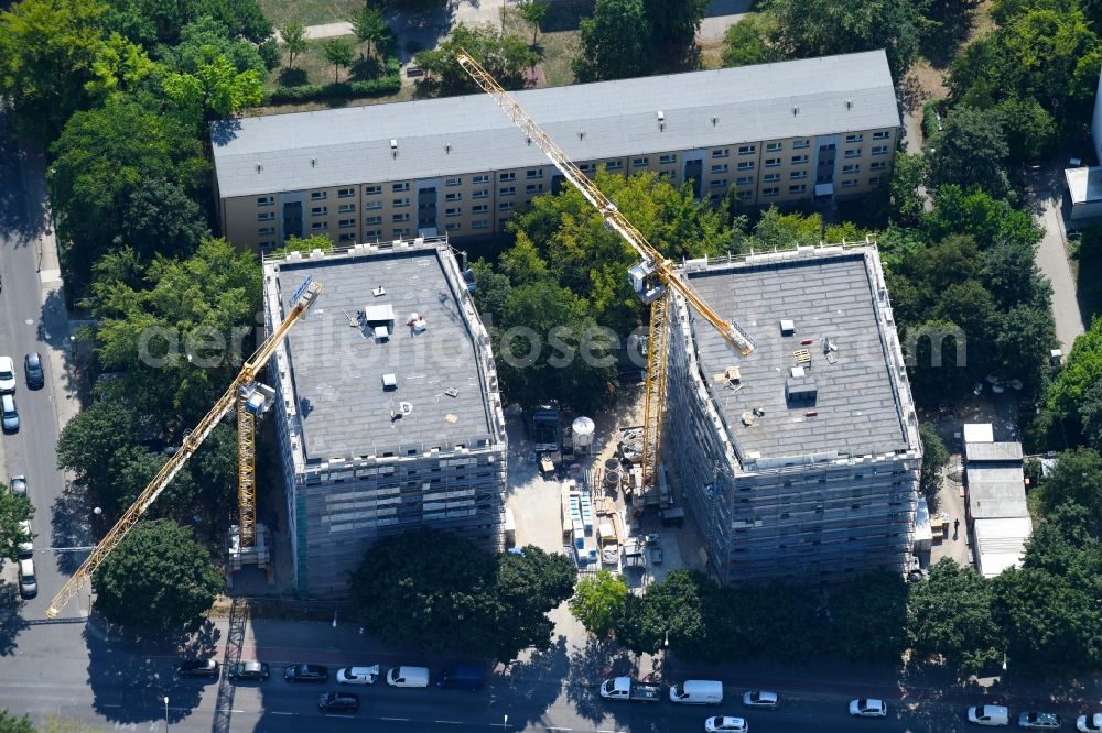 Aerial image Berlin - Residential construction site with multi-family housing development- on the Sewanstrasse - Salzmannstrasse - Huronseestrasse in the district Lichtenberg in Berlin, Germany