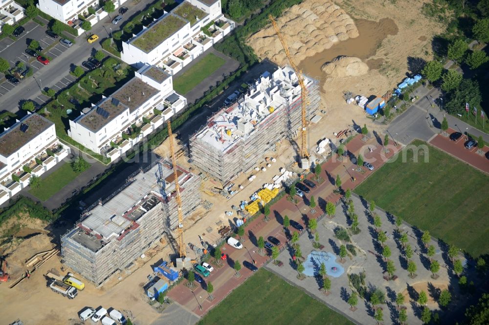 Berlin from the bird's eye view: Construction site and residential area Steglitzer ParkQuartier in the Lichterfelde part of the district of Steglitz-Zehlendorf in Berlin. New multi-family homes and estates are being developed on the site of the Square of the US-Berlin-Brigades which is surrounded by woods, green areas and playgrounds. It is developed by the Swedish Construction and Real Estate Company NCC AB