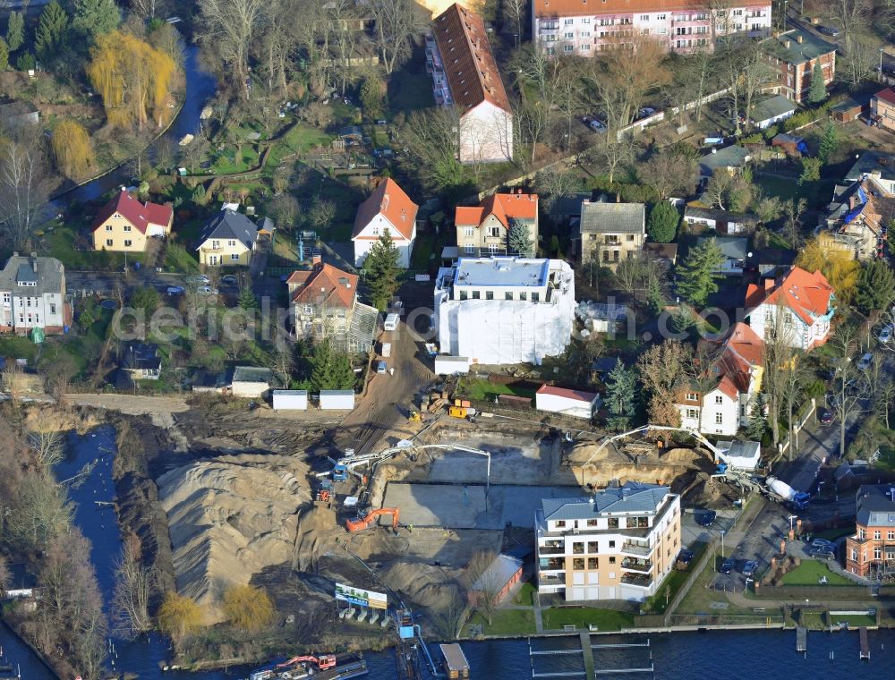 Aerial image Berlin - Construction site to build a new residential area in the district Treptow-Koepenick in Berlin. The building is near the Neuenhagener Muehlenfliess and the Mueggelspree. The aera is next to the Salvador-Allende-Strasse