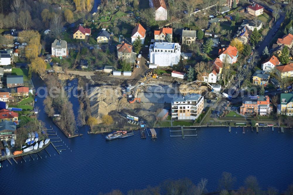 Aerial photograph Berlin - Construction site to build a new residential area in the district Treptow-Koepenick in Berlin. The building is near the Neuenhagener Muehlenfliess and the Mueggelspree. The aera is next to the Salvador-Allende-Strasse