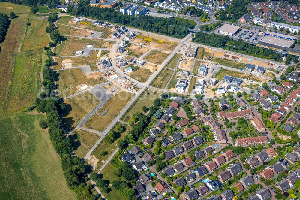 Aerial image Duisburg - Residential area construction site of a mixed development with multi-family houses and single-family houses- New building at the Am Alten Angerbach in the district Huckingen in Duisburg at Ruhrgebiet in the state North Rhine-Westphalia, Germany