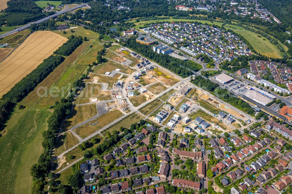 Aerial photograph Duisburg - Residential area construction site of a mixed development with multi-family houses and single-family houses- New building at the Am Alten Angerbach in the district Huckingen in Duisburg at Ruhrgebiet in the state North Rhine-Westphalia, Germany