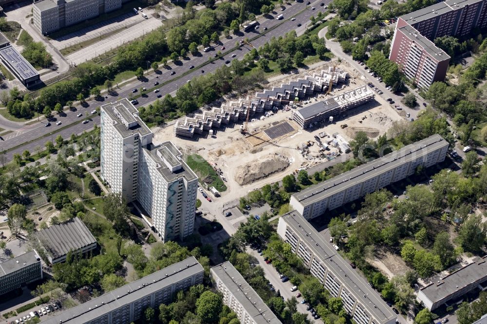 Berlin from above - Construction site of a new residential area of Gensinger Viertel in the Friedrichsfelde part of Lichtenberg in Berlin in Germany. The site is located on Gensinger Strasse and is part of a gentrification and re-development project of the area. Hanseatische Immobilien Treuhand is building single family units, semi-detached houses and town houses