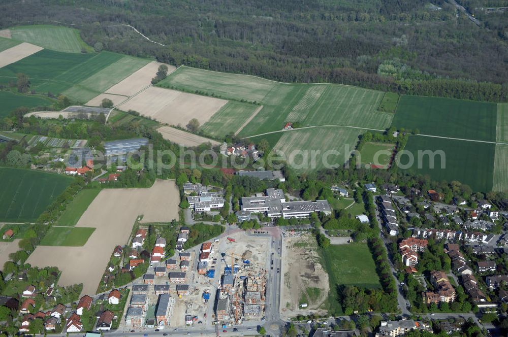 Garching from the bird's eye view: Baustelle des Wohnneubaugebietes am Professor-Angermair-Ring / Mühlfeldweg in Garching bei München. Ein Projekt der Concept Bau - Premier GmbH.