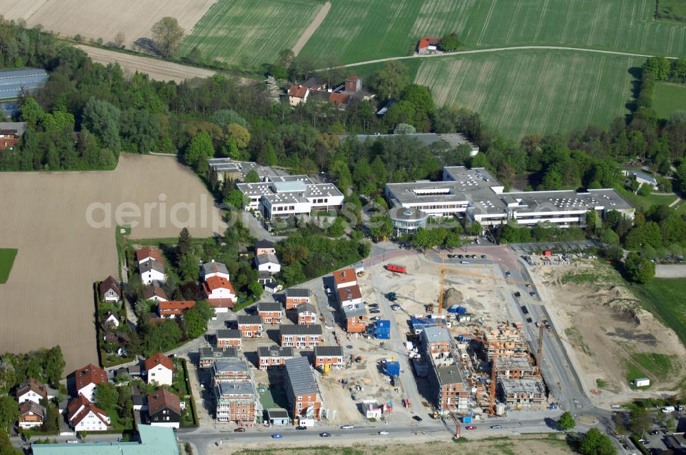 Aerial photograph Garching - Baustelle des Wohnneubaugebietes am Professor-Angermair-Ring / Mühlfeldweg in Garching bei München. Ein Projekt der Concept Bau - Premier GmbH.