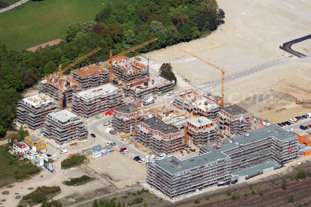 München from the bird's eye view: Baustelle des Wohnneubaugebietes Wotan- Winfriedstrasse am Hirchgarten der Concept Bau - Premier GmbH.