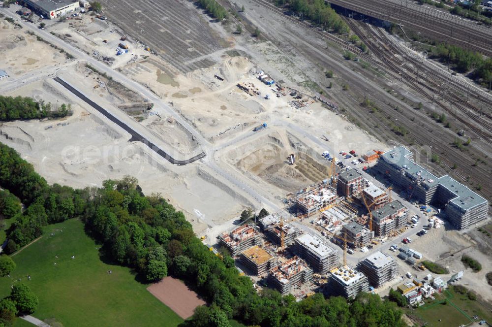 München from the bird's eye view: Baustelle des Wohnneubaugebietes Wotan- Winfriedstrasse am Hirchgarten der Concept Bau - Premier GmbH.