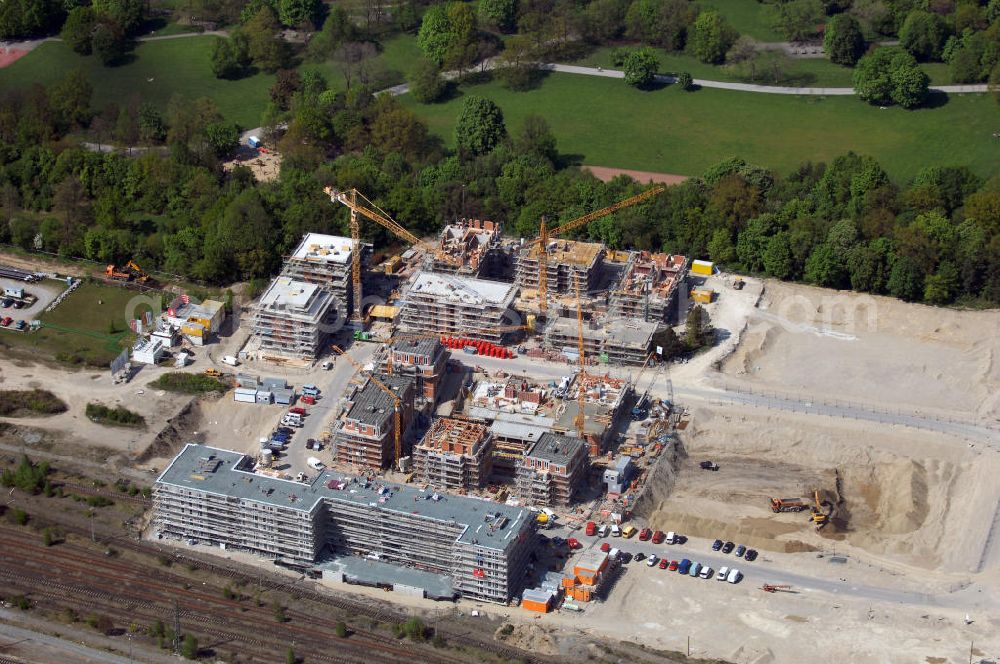 München from the bird's eye view: Baustelle des Wohnneubaugebietes Wotan- Winfriedstrasse am Hirchgarten der Concept Bau - Premier GmbH.