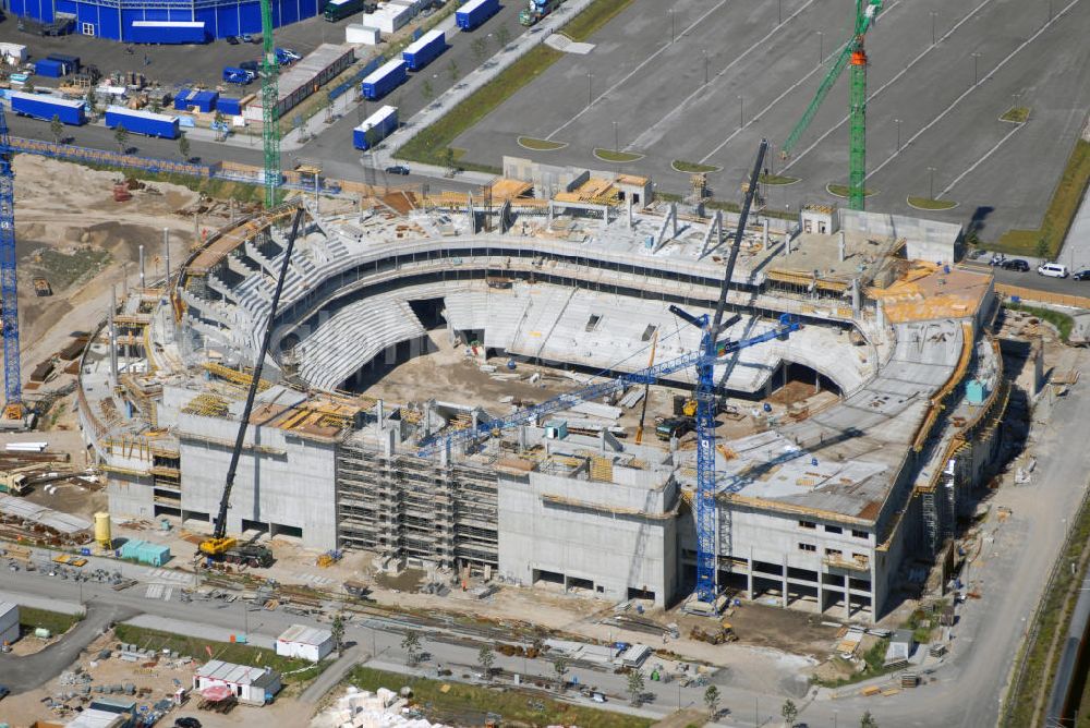 Berlin from the bird's eye view: Construction site of the event hall O2-World at the Medi-Spree a development area at the old post station area in Berlin - Friedrichshain