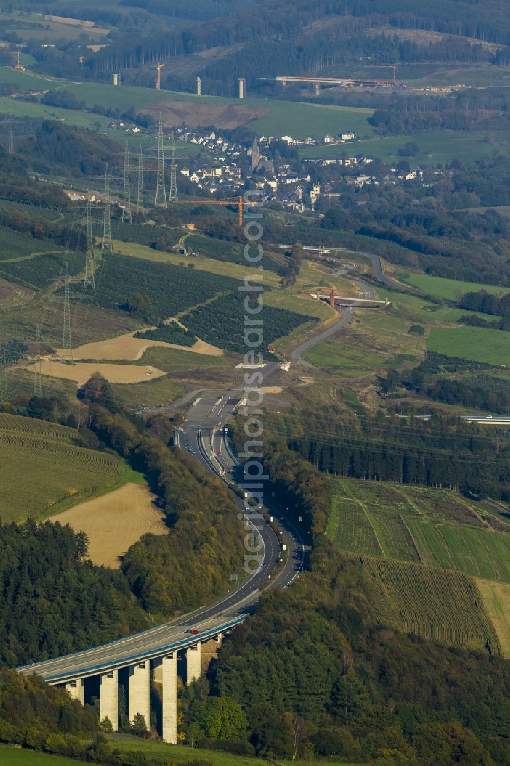 Meschede from the bird's eye view: Construction site extension of the motorway A46 motorway in the region of the outskirts in Meschede in the State of North Rhine-Westphalia