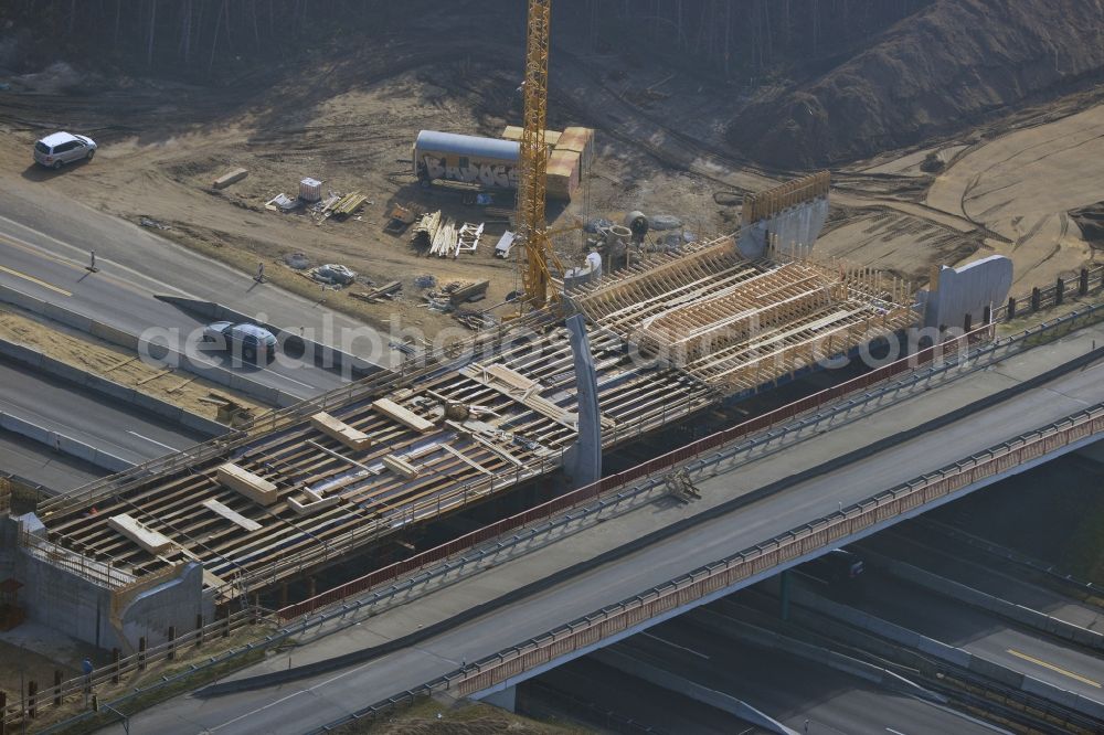 Kremmen from the bird's eye view: Construction site of expansion of the junction Kremmen - Havelland at the motorway A10 and A24 in the state Brandenburg