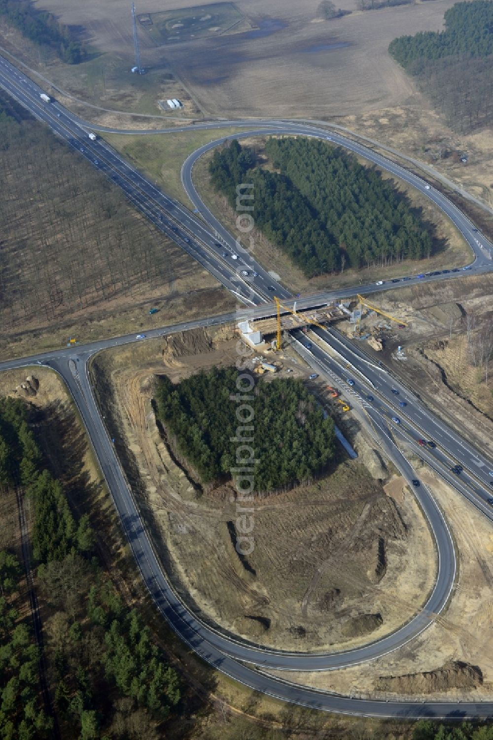 Kremmen from the bird's eye view: Construction site of expansion of the junction Kremmen - Havelland at the motorway A10 and A24 in the state Brandenburg