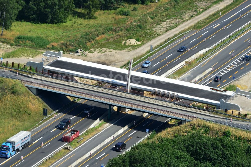 Kremmen from the bird's eye view: Construction site of expansion of the junction Kremmen - Havelland at the motorway A10 and A24 in the state Brandenburg