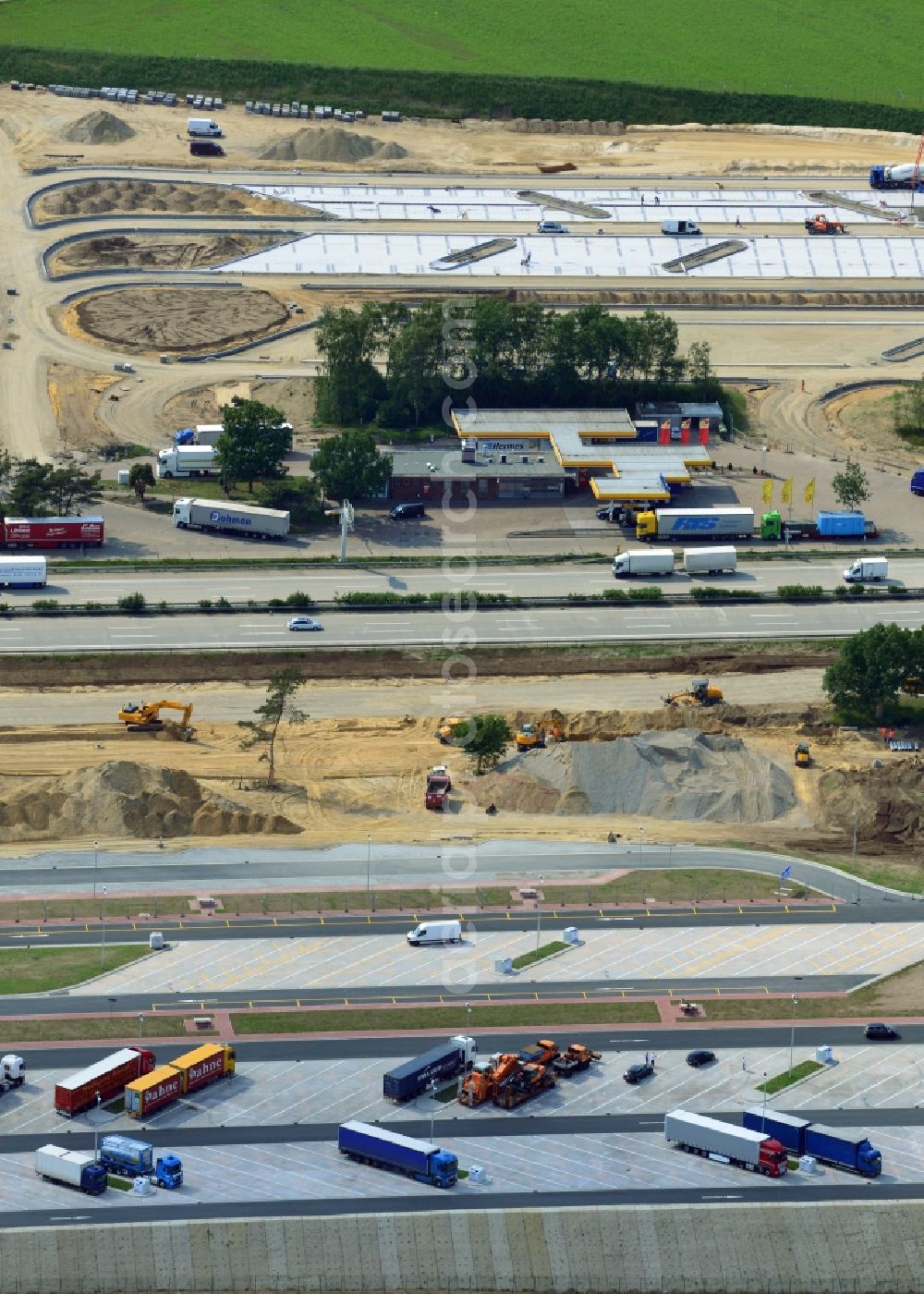 Aerial photograph Behringen - Construction site for the development of truck parking at the BAB A7 motorway at the service area at Brunautal Behringen in Lower Saxony