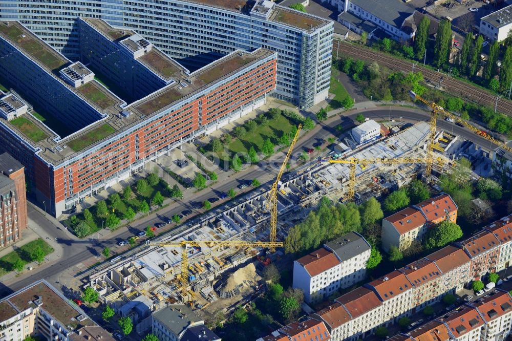 Aerial image Berlin - Construction site of the new development livingvictoria on Schreiberhauer Strasse in the Lichtenberg district of Berlin in Germany. Town houses and luxury appartment buildings are being built between residential and office buildings. The project is named after the historic Victoria town part and is run by Triacon