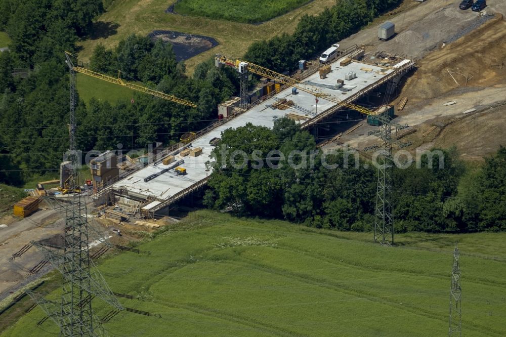 Aerial photograph Mettmann - Construction site of new bridge in Linde Heider Strasse in Mettmann in North Rhine-Westphalia. Building contractor is the company Betam GmbH NL Engineering