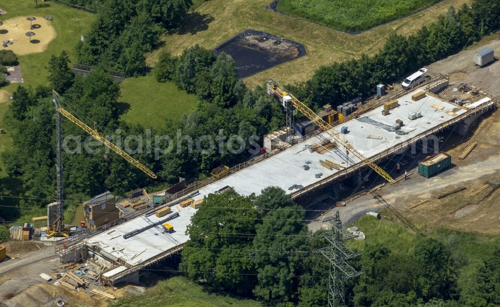 Aerial photograph Mettmann - Construction site of new bridge in Linde Heider Strasse in Mettmann in North Rhine-Westphalia. Building contractor is the company Betam GmbH NL Engineering