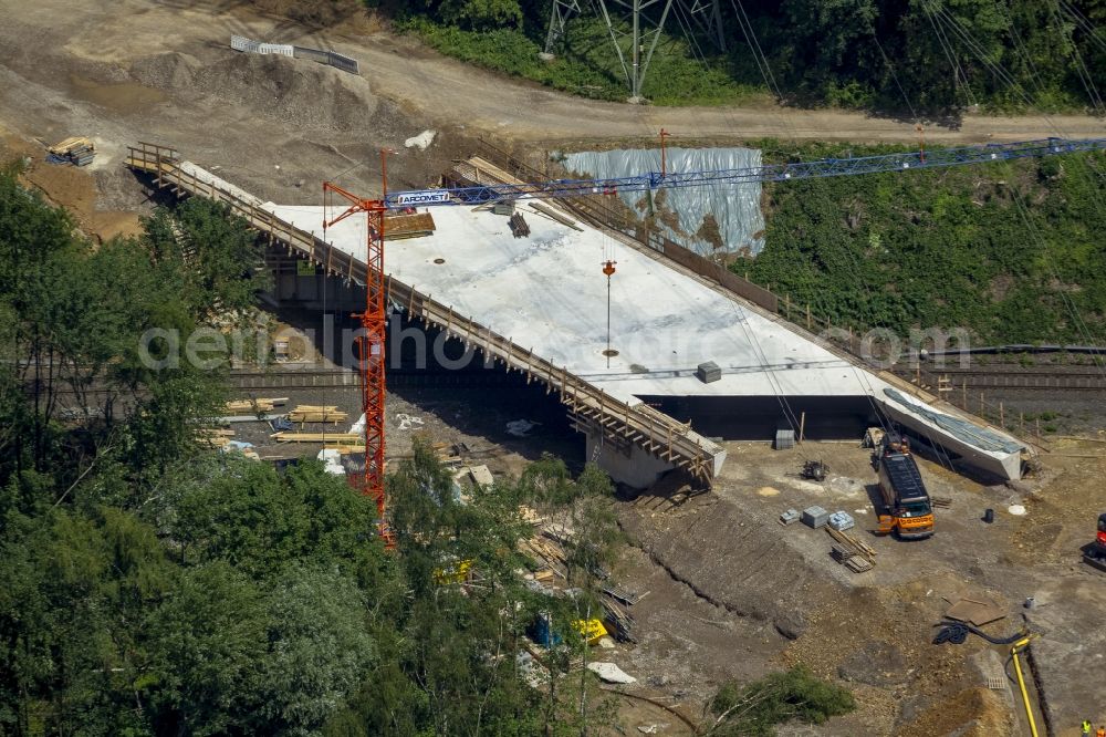 Aerial photograph Mettmann - Construction site of new bridge in Linde Heider Strasse in Mettmann in North Rhine-Westphalia. Building contractor is the company Betam GmbH NL Engineering