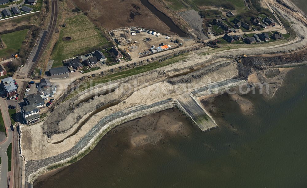 Dagebüll from above - Construction site for the new construction of the dyke protection strip Klimadeich on Dagebueller Koog on the street Am Badedeich in Dagebuell North Friesland in the state Schleswig-Holstein, Germany