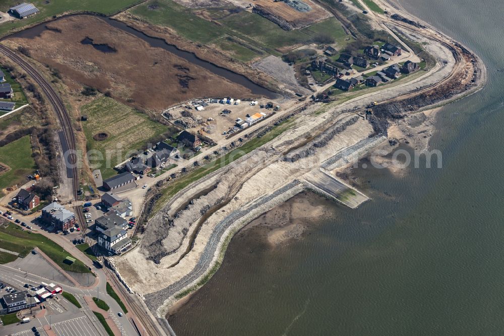 Dagebüll from the bird's eye view: Construction site for the new construction of the dyke protection strip Klimadeich on Dagebueller Koog on the street Am Badedeich in Dagebuell North Friesland in the state Schleswig-Holstein, Germany