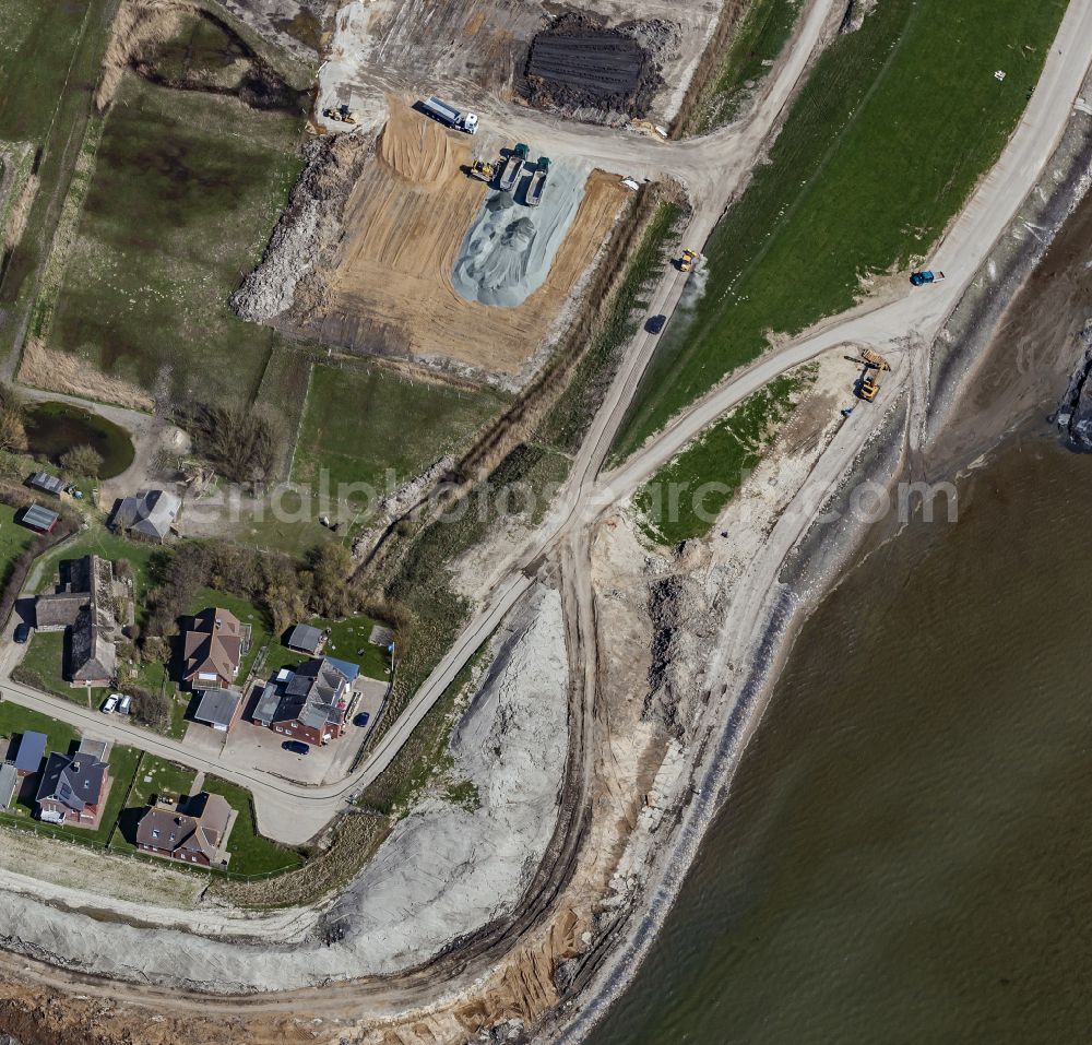 Aerial image Dagebüll - Construction site for the new construction of the dyke protection strip Klimadeich on Dagebueller Koog on the street Am Badedeich in Dagebuell North Friesland in the state Schleswig-Holstein, Germany