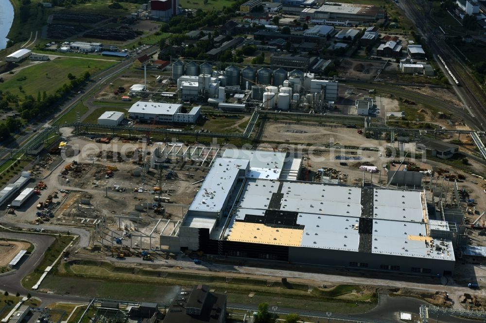 Lutherstadt Wittenberg from the bird's eye view: Construction site for the new building of storage for the SKW Stickstoffwerke Piesteritz GmbH in Lutherstadt Wittenberg in the state Saxony-Anhalt