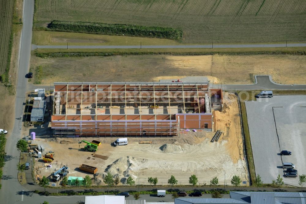 Gütersloh from above - Construction site for the new building eines ALDI Einkaufszentrums an der Herzbrocker Strasse in Guetersloh in the state North Rhine-Westphalia