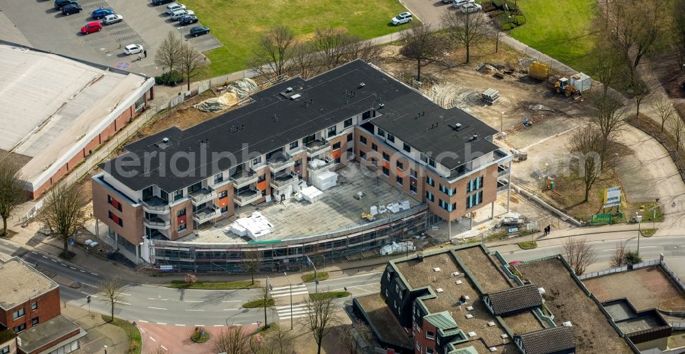 Bottrop from the bird's eye view: Construction site for the new building eines Aldi- store on Schukze-Delitzsch-Strasse - Hauptstrasse in the district Kirchhellen in Bottrop in the state North Rhine-Westphalia