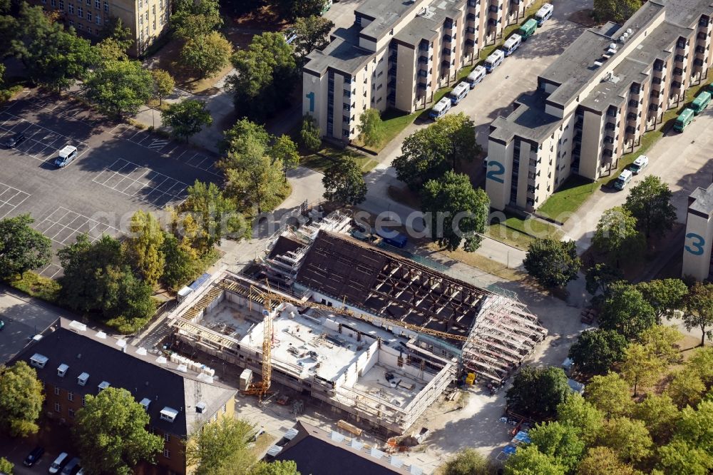 Aerial image Berlin - Construction of a training building and a sports hall on the grounds of the police police school of the Berlin police on the Charlottenburger Strasse in the district Ruhleben in Berlin