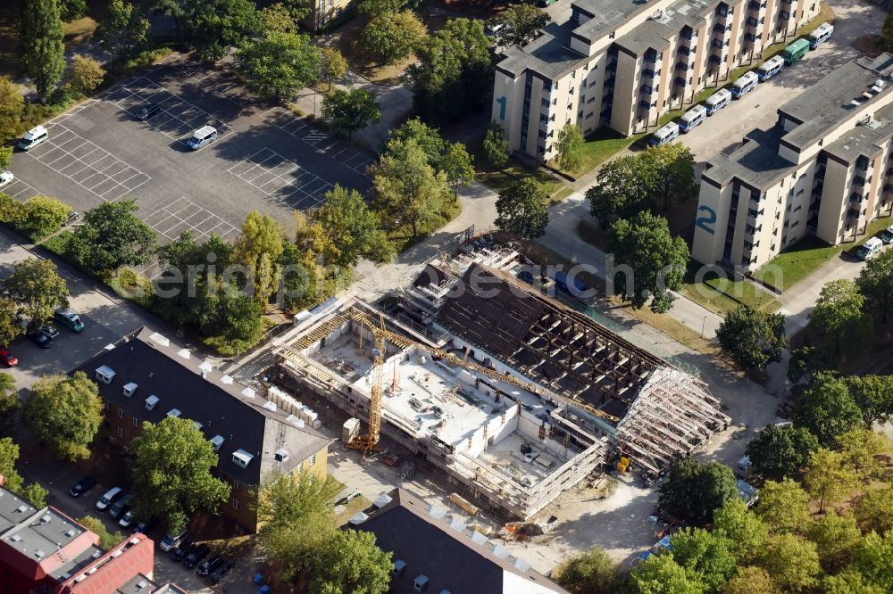 Aerial photograph Berlin - Construction of a training building and a sports hall on the grounds of the police police school of the Berlin police on the Charlottenburger Strasse in the district Ruhleben in Berlin