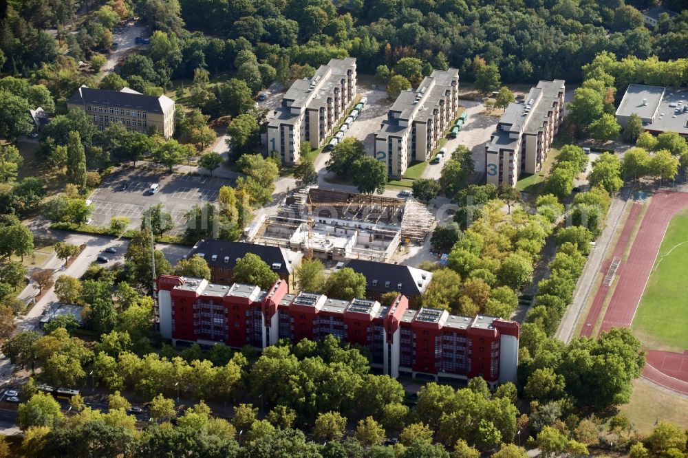 Aerial photograph Berlin - Construction of a training building and a sports hall on the grounds of the police police school of the Berlin police on the Charlottenburger Strasse in the district Ruhleben in Berlin
