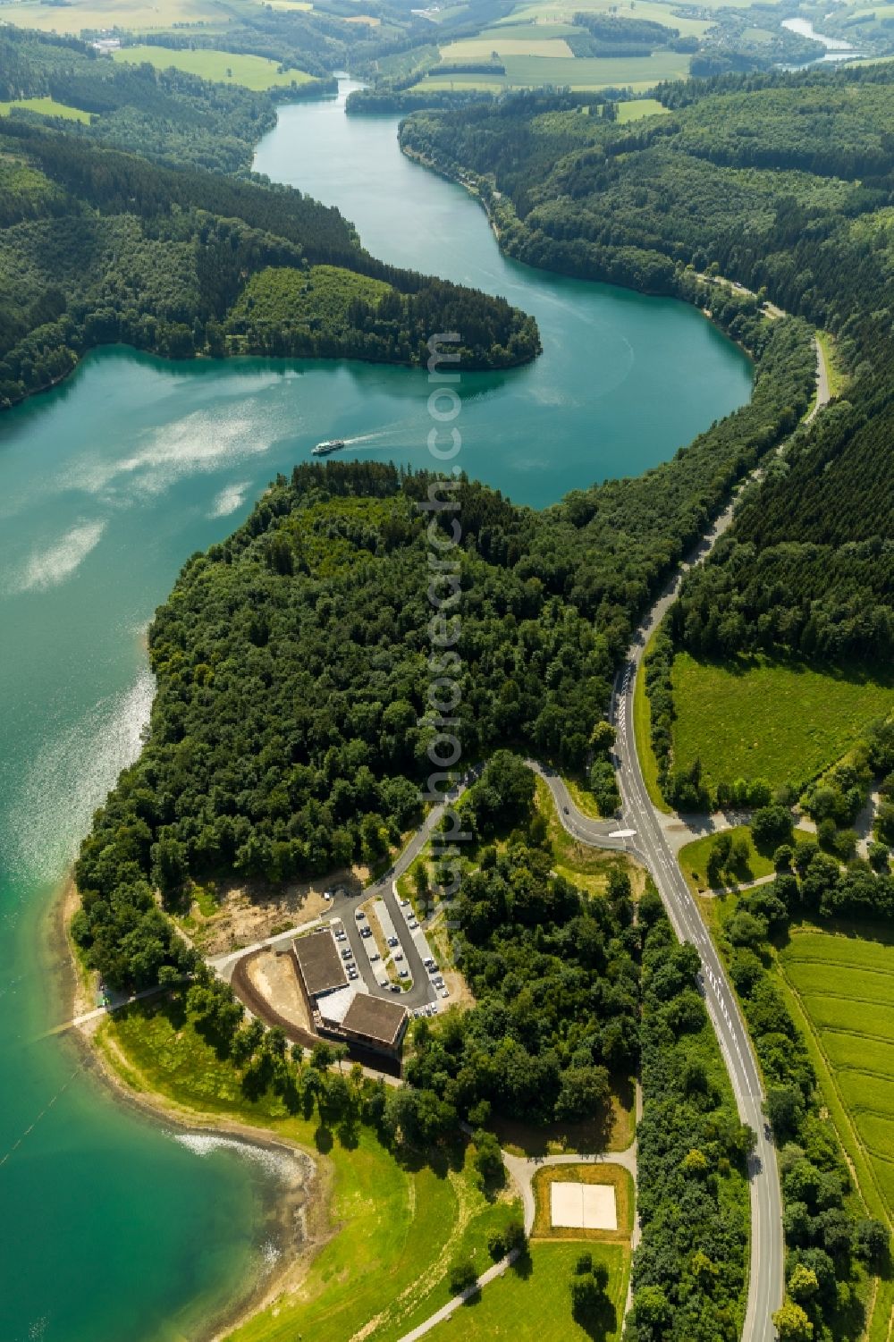 Meschede from the bird's eye view: Construction site for the new building gastronomy H1 am See lokation and restaurant on Hennesee in Meschede in the state North Rhine-Westphalia, Germany