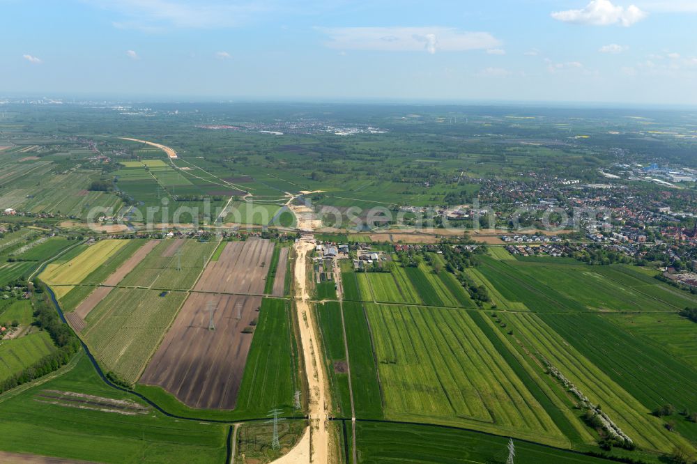 Buxtehude from the bird's eye view: Construction site for new construction on the motorway route of the motorway A26 exit in the district Eilendorf in Buxtehude in the state of Lower Saxony, Germany