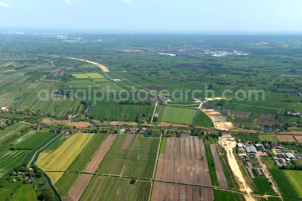 Buxtehude from the bird's eye view: Construction site for new construction on the motorway route of the motorway A26 exit in the district Eilendorf in Buxtehude in the state of Lower Saxony, Germany