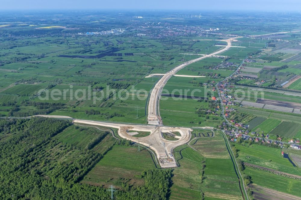 Neu Wulmstorf from the bird's eye view: Construction site for new construction on the motorway route of the motorway exit A26 in Neu Wulmstorf in the state of Lower Saxony, Germany