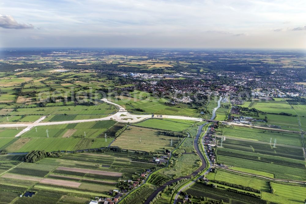 Neu Wulmstorf from above - Construction site for new construction on the motorway route of the motorway exit A26 in Neu Wulmstorf in the state of Lower Saxony, Germany