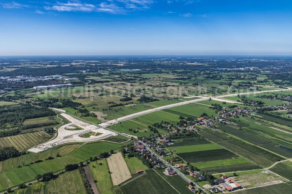 Neu Wulmstorf from the bird's eye view: Construction site for new construction on the motorway route of the motorway exit A26 in Neu Wulmstorf in the state of Lower Saxony, Germany