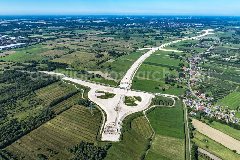 Neu Wulmstorf from the bird's eye view: Construction site for new construction on the motorway route of the motorway exit A26 in Neu Wulmstorf in the state of Lower Saxony, Germany