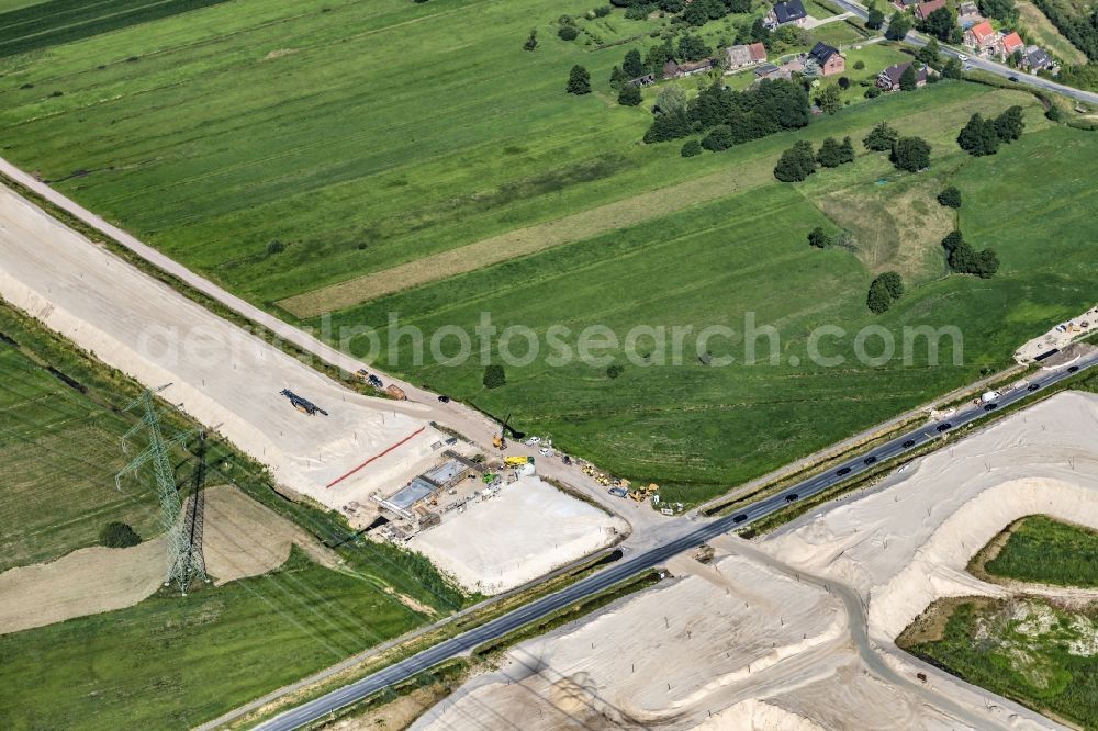 Neu Wulmstorf from above - Construction site for new construction on the motorway route of the motorway exit A26 in Neu Wulmstorf in the state of Lower Saxony, Germany