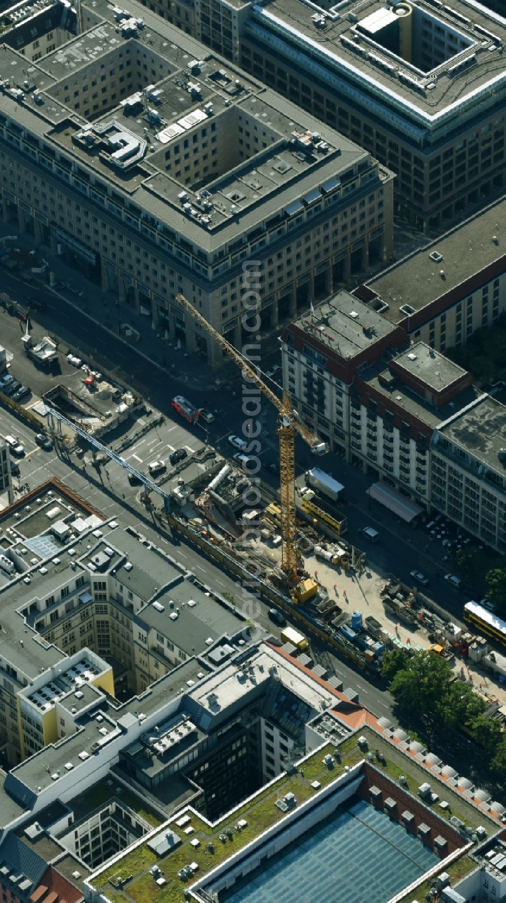 Berlin from above - Construction site for the new subway line in the street Unter den Linden in the district of Mitte in Berlin